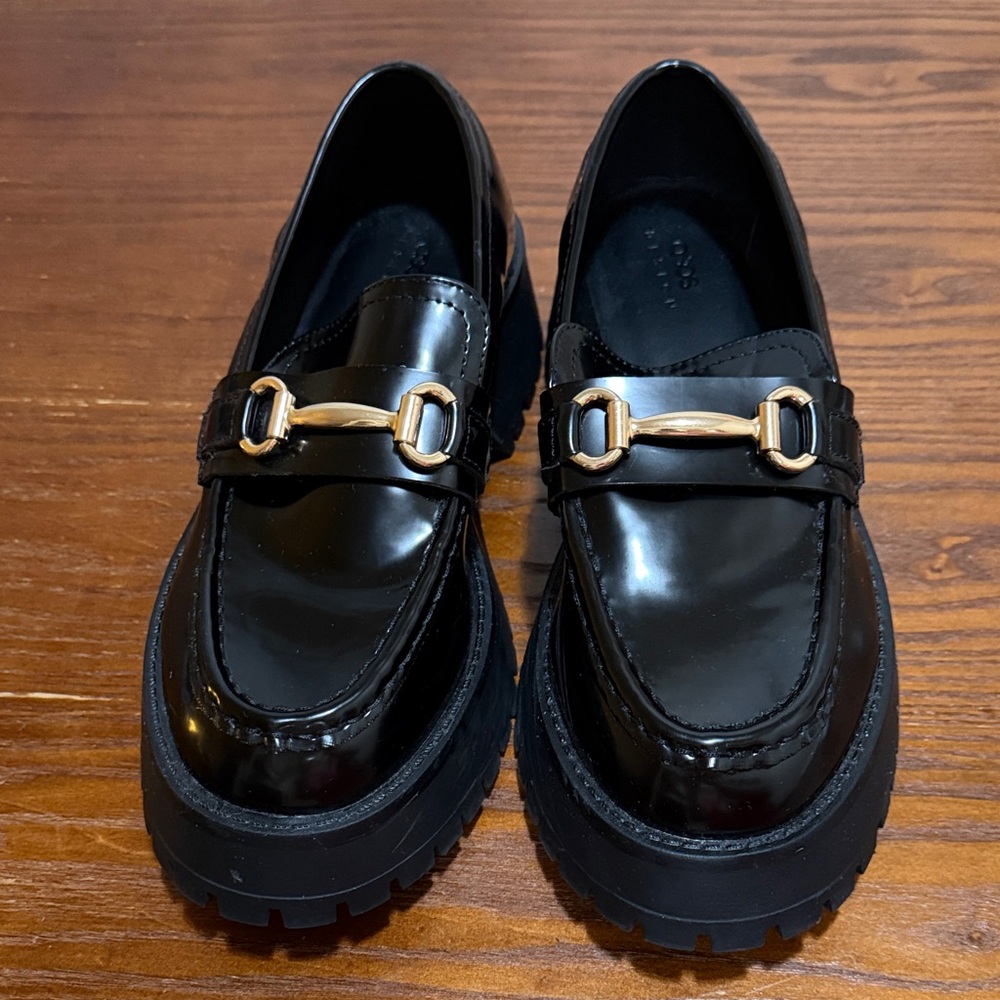 Black Loafers with Gold Buckle Detail